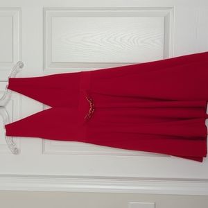 Sleeveless, candy apple red with gold detail, v neck front and back, knit dress